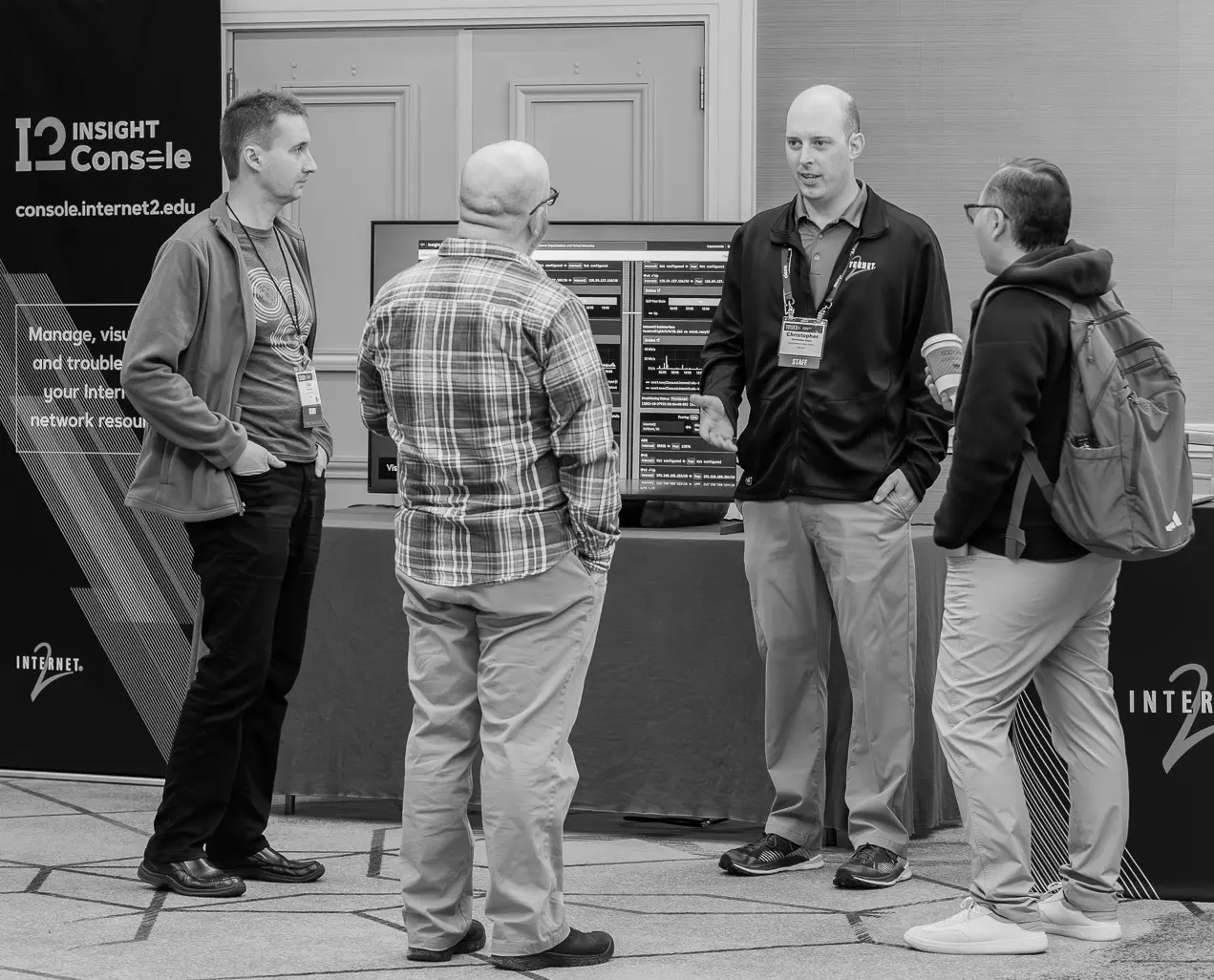 Christopher talking to friends at TechEx